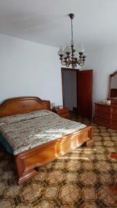 En eller flere senge i et værelse på Il giardino di Borgo Nuovo