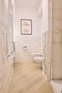 Koupelna v ubytování Lollo House Borgo Opifici + 51 fotografií