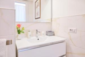 Koupelna v ubytování Lollo House Borgo Opifici