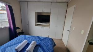 En eller flere senge i et værelse på La Estancia 399