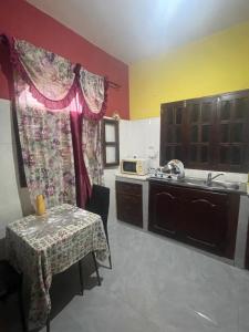 Kuchyň nebo kuchyňský kout v ubytování Suite Casa Mendes + 8 fotografií