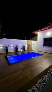 Swimmingpoolen hos eller tæt på Refúgio dos Sonhos Conforto e Tranquilidade