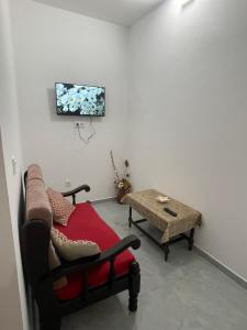 TV a/nebo společenská místnost v ubytování Suite Casa Mendes