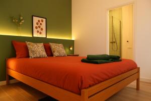 Giường trong phòng chung tại Studio cosy et moderne avec jardin, Le Villanova