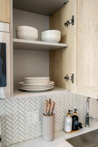 Køkken eller tekøkken på The Village Collection with Gym Pool and Spa