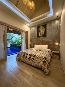 En eller flere senge i et værelse på Villa deluna