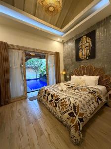 En eller flere senge i et værelse på Villa deluna