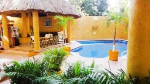Swimmingpoolen hos eller tæt på Villas La Lupita