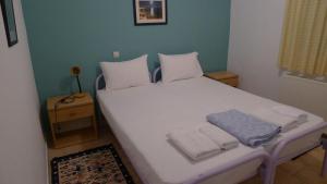 En eller flere senge i et værelse på Villa Goitia