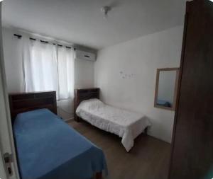 ポルト・ベロにあるApartamento com piscina em Porto Beloのギャラリーの写真 +1枚の写真