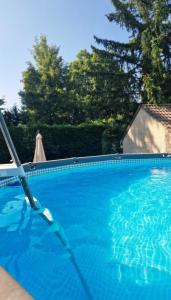 Swimmingpoolen hos eller tæt på La Maison des Petits Bonheurs