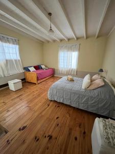 Ένα ή περισσότερα κρεβάτια σε δωμάτιο στο Hospedaje - Rincon de Paso - RC