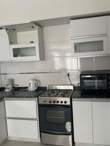 Nhà bếp/bếp nhỏ tại Colinas de Peralta Ramos +1 ảnh