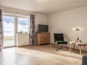 Televiisor ja/või meelelahutuskeskus majutusasutuses Alpenglück