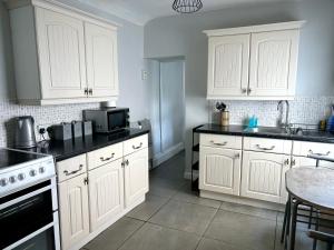 Køkken eller tekøkken på 4 Cross Ifor Terrace