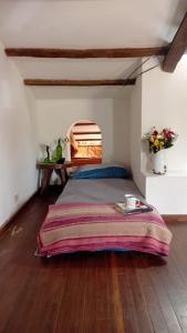 Postel nebo postele na pokoji v ubytování Casa Alquimia La Cabaña