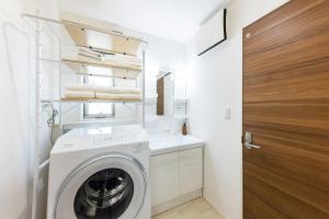 Koupelna v ubytování Mukae House + 47 fotografií