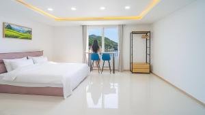 Una cama o camas en una habitación de Gapyeong Boreum-Dal Poolvilla 1 fotos más
