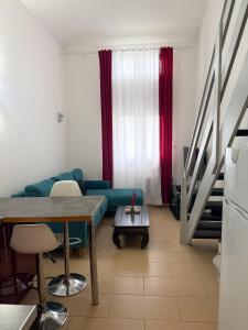 En eller flere senge i et værelse på Duplex Studio 4 pers - 15 min de Disney - RER A 5 min