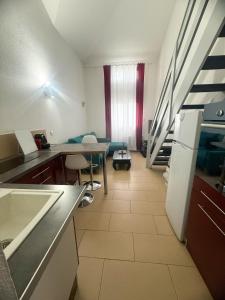 Køkken eller tekøkken på Duplex Studio 4 pers - 15 min de Disney - RER A 5 min + 2 billeder