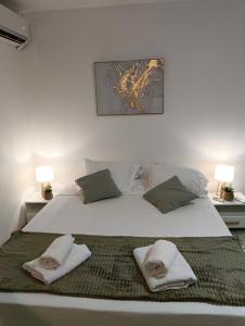 Postel nebo postele na pokoji v ubytování Rêve Créole, accès piscine, plage et golf