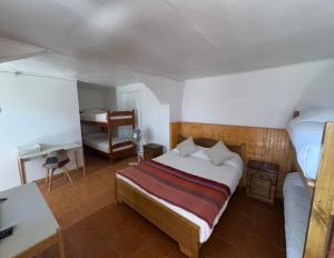 Postel nebo postele na pokoji v ubytování Hotel Turi Atacama