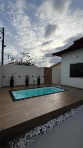 Swimmingpoolen hos eller tæt på Refúgio dos Sonhos Conforto e Tranquilidade