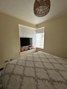 Et tv og/eller underholdning på Departamento Bellavista