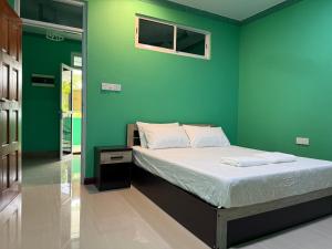 Postel nebo postele na pokoji v ubytování Coconut Palm Dhidhoo + 13 fotografií