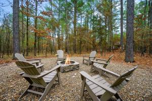 a group of chairs sitting around a fire pit at Amazing Views Hot Tub Fire Pit Dog Friendly in Stephens Gap