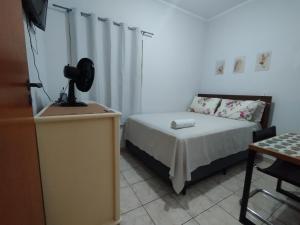 En eller flere senge i et værelse på Quarto Hokkaido na Sakura House