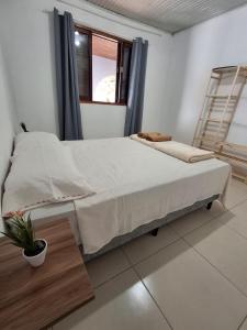 Postel nebo postele na pokoji v ubytování Casa no Centro Livramento - Rivera perto Freeshop