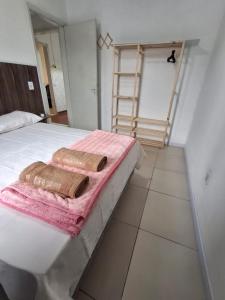 Postel nebo postele na pokoji v ubytování Casa no Centro Livramento - Rivera perto Freeshop