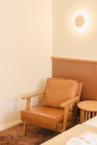 Posezení v ubytování The Alluna Motel, an Ascend Collection Hotel