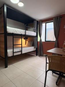 Postel nebo postele na pokoji v ubytování Bohemia Boutique Hostel