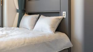 Postel nebo postele na pokoji v ubytování Gangneung Badauibyeol Pension