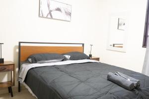 Giường trong phòng chung tại Descanso y compras en Zona Río frontera cercana