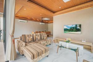 Khu vực ghế ngồi tại Anara Pool Villa 3 Bedrooms