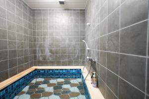 Phòng tắm tại 新別府荘 +65 ảnh