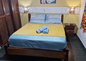 Postel nebo postele na pokoji v ubytování Pousada Costa Verde Tabatinga