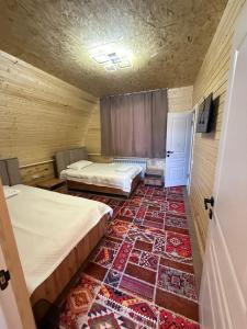 Postel nebo postele na pokoji v ubytování Alban