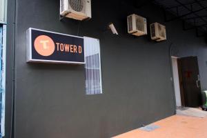 a black wall with a sign on a building at T Hotel Tandop in Alor Setar +87 photos