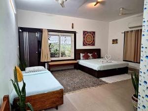 Ένα ή περισσότερα κρεβάτια σε δωμάτιο στο Sublime Homestay