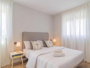 En eller flere senge i et værelse på Apartamento Mar Salada Bocal