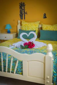 Un pat sau paturi într-o cameră la BELLA House