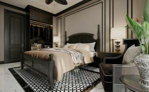 May Boutique DongVan Hotel في دونغ فان: غرفة نوم بها سرير وكرسي وطاولة