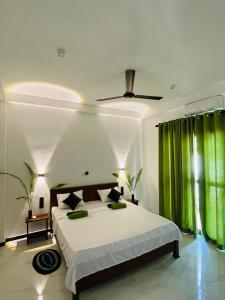 Postel nebo postele na pokoji v ubytování THE PRASINOS villa & resort