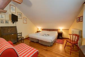 En eller flere senge i et værelse på Grangia Sunset View - Happy Rentals