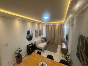 Телевизор и/или развлекательный центр в Apartamento- ótima localização-aconchegante e completo no Centro - SJC