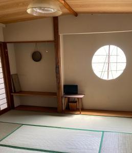 TV a/nebo společenská místnost v ubytování Taiyo Yuki Lodge